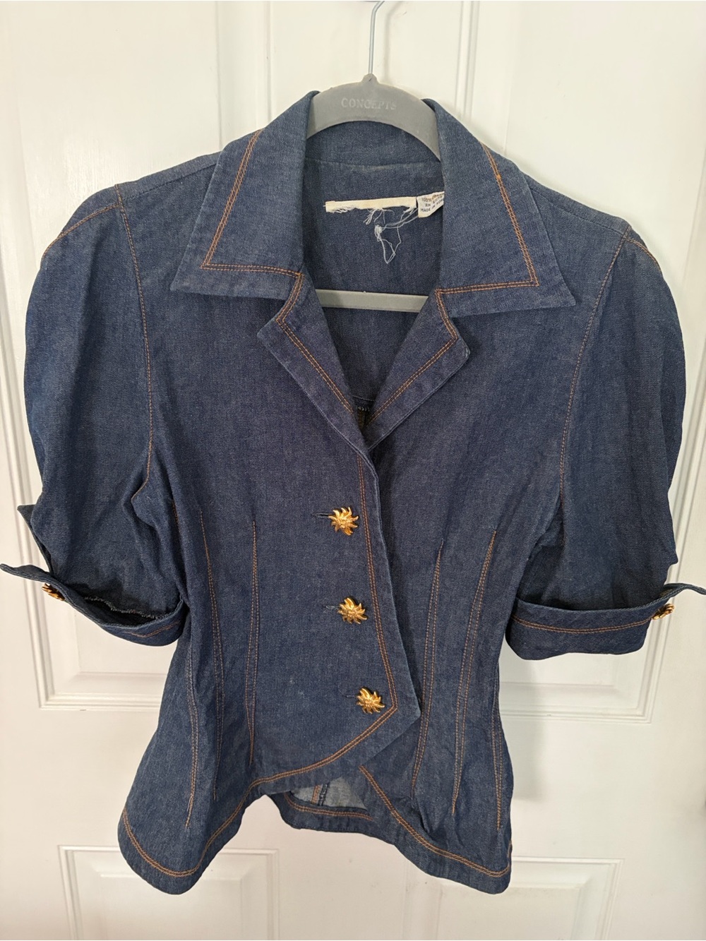 Denim blouse/ shirt with three gold buttons in front & two buttons around cuffs